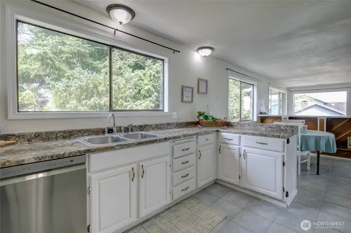 Spacious kitchen with tons of natural light with the large windows.