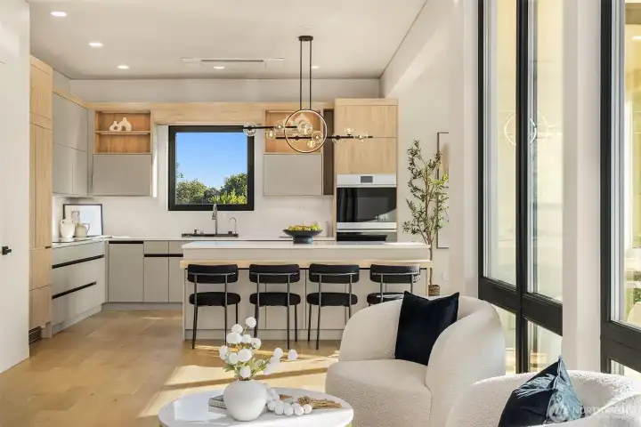 Sleek and functional – Artisan-crafted cabinetry meets high-end appliances.