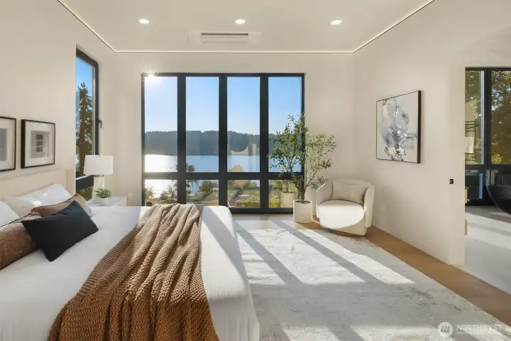 Primary retreat – Wake up to sweeping lake views and natural light.