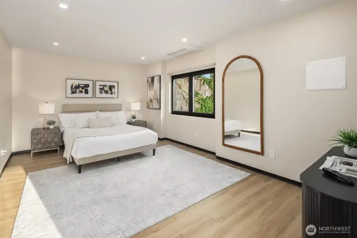 Private comfort – Light-filled guest suite offering privacy and style.
