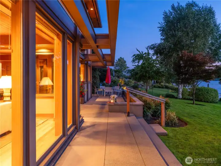 The beautiful terrace along the home's western side is perfect for relaxing or entertaining against a backdrop of views