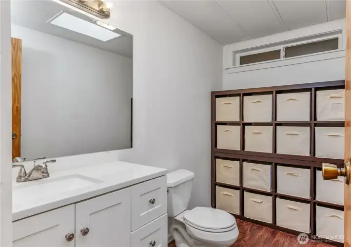 Half bath located in hallway.