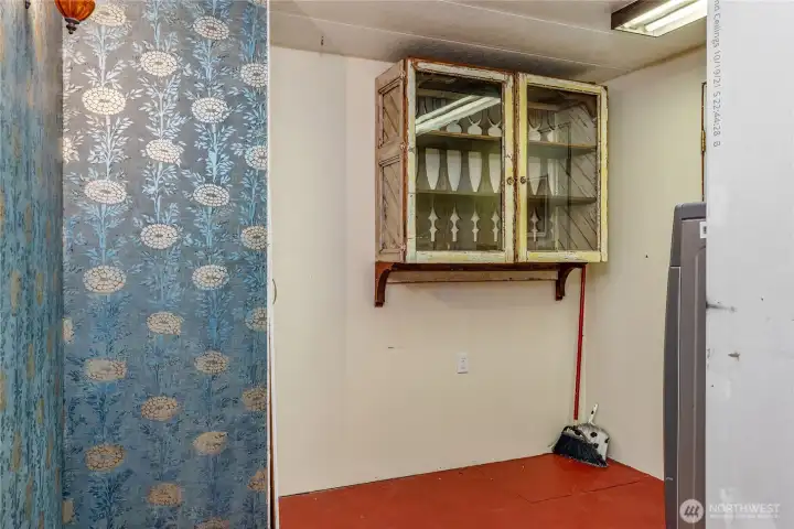 Lots of storage in laundry room.
