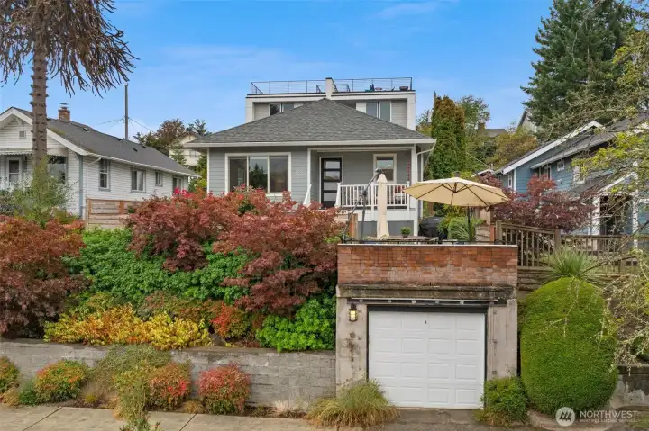 Perched on the high side of the street lends privacy and territorial views. Don't miss the 1 car garage!