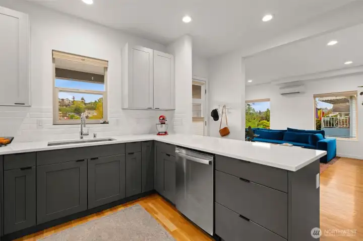 Kitchen opens to dining and living rooms