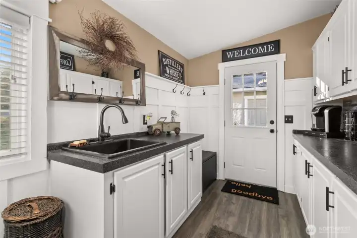 Utility sind in entry way/laundry room