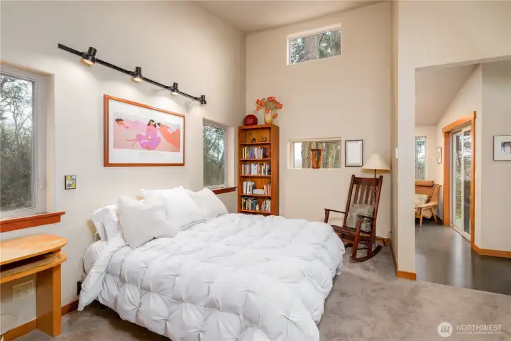 A spacious and calming retreat designed for rest and privacy, featuring warm natural light, thoughtful architectural details, and a seamless connection to the home’s outdoor living spaces.