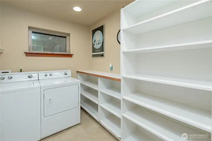 An inviting laundry area featuring a bright and organized utility space designed with clean lines and thoughtful storage, supporting the home’s emphasis on simplicity, function, and everyday ease.
