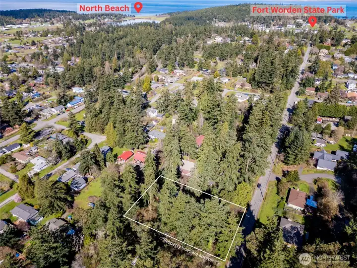 Captured from above, these views showcase the home’s setting near Fort Worden and North Beach, two of Port Townsend’s most beloved outdoor destinations.