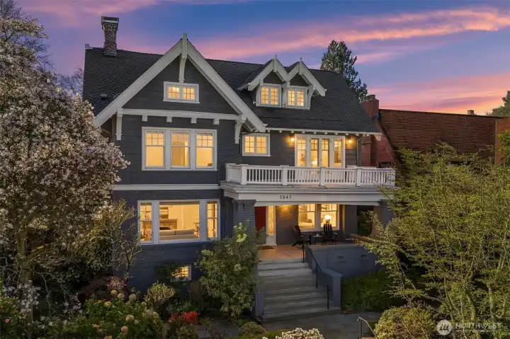 Ideally located Charles Haynes Craftsman with sparkling lake, mountain and skyline views.