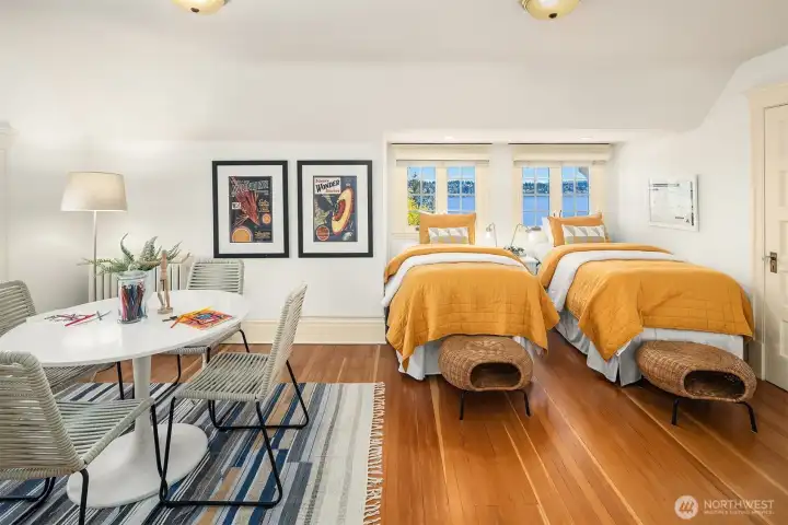 Third level has two additional bedrooms and full bath.