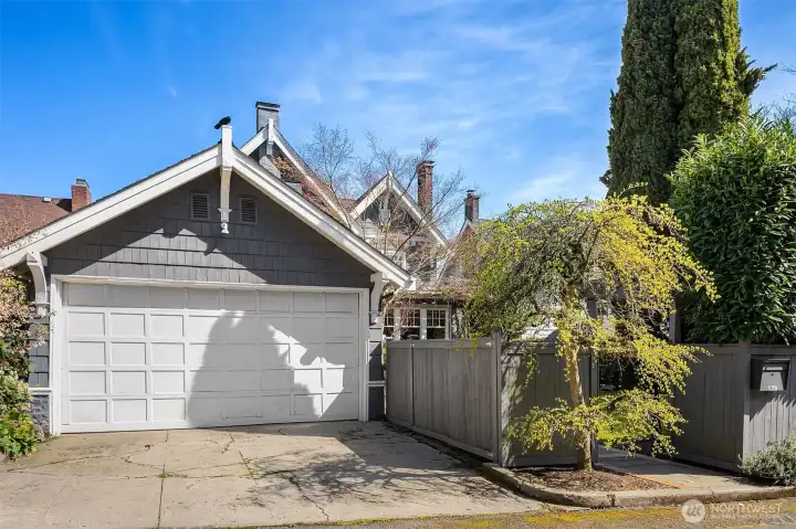 Huge two car garage, enclosed garbage/recycling area, plus additional hige storage shed.