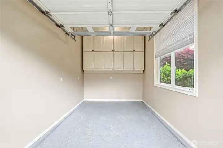 Separate garage bay perfect for a work shop, sports car or storage.