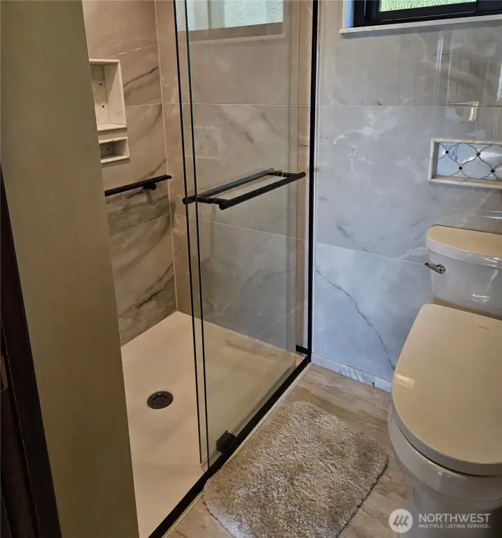 Primary Bathroom Shower and Bidet Toilet