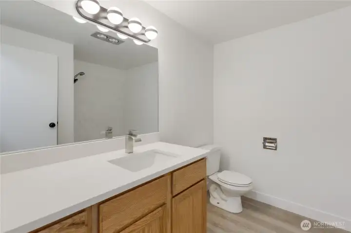 New quartz countertops, new lighting, fresh paint.