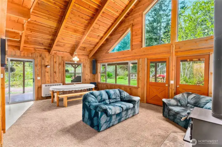Dining room area open to living room with glorious natural light