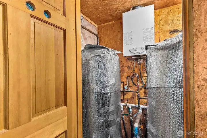 Water system closet in the large garage.
