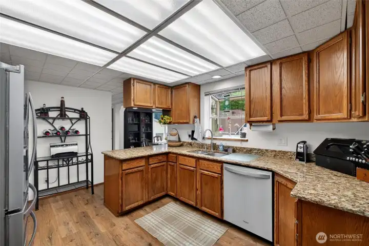 Kitchen opens up to an eat in nook