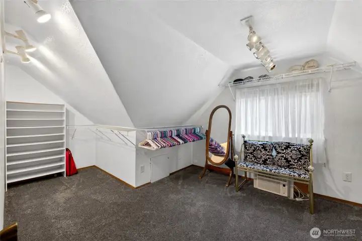 Walk in closet in primary suite