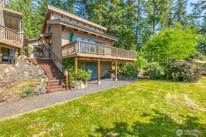 The Studio includes a lower basement/storage area under the structure, and covered area under the deck