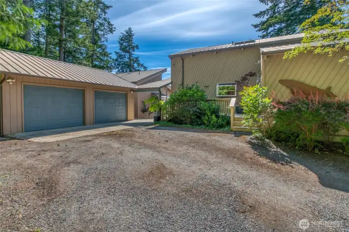 Plenty of parking in the driveway and heated two car garage.