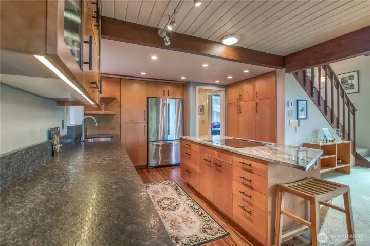 Design for remodeling the kitchen came from Bonnie Ward. The open floor plan for the kitchen, dining and living space gives this home a feeling of inclusion and connection.