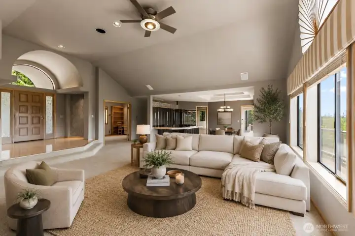 virtually staged - Spacious living areas offer endless possibilities for furniture layouts, gathering spaces, and entertaining, all enhanced by abundant natural light and views beyond.