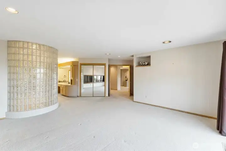 The primary suite offers exceptional space and functionality, with a large walk-in closet, generous ensuite, and room to create your own private retreat.