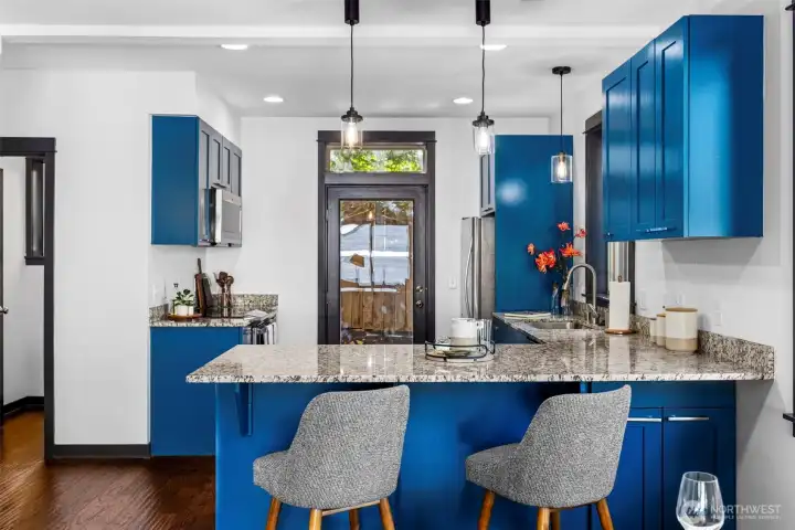 A wide open kitchen design designed to handle everything from quick weeknight meals to weekend hosting.