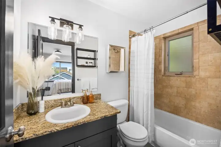 A full primary ensuite bathroom.