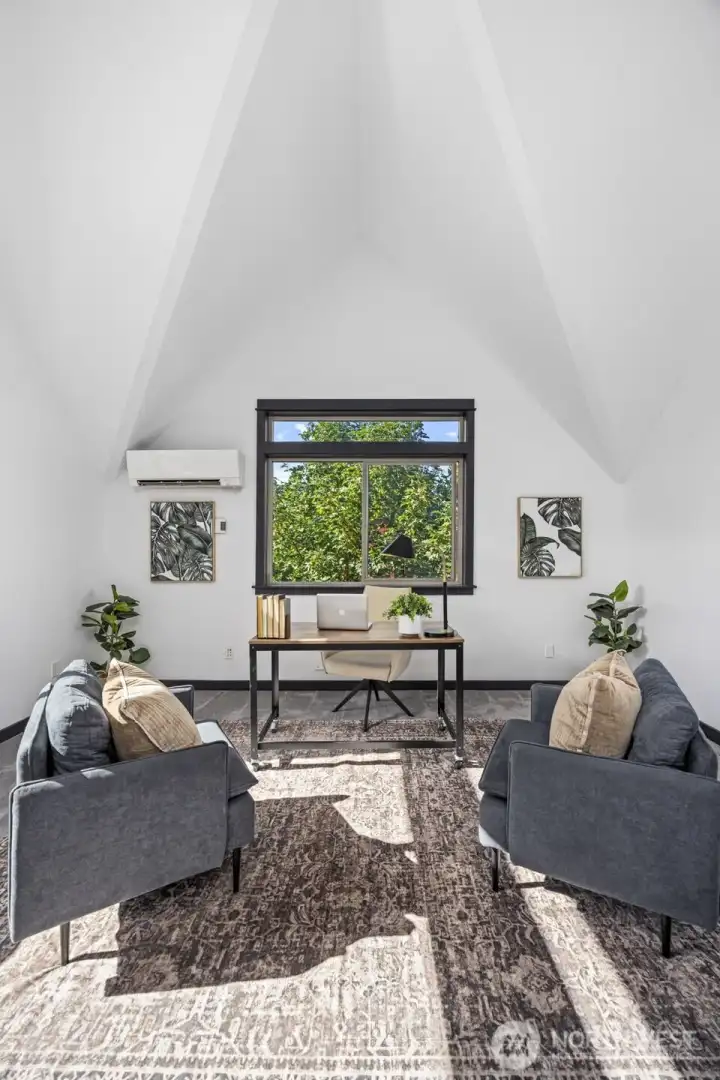 This elevated loft space provides a quiet, inspiring backdrop for your work-from-home days.