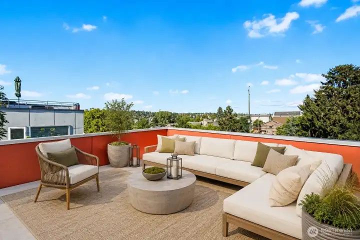 Expand your living space outdoors with a private rooftop deck designed for summer hosting.  *Virtually staged*
