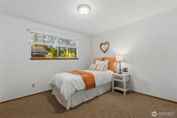 The second additional bedroom also has a large window. The second additional bedroom also has a large window.