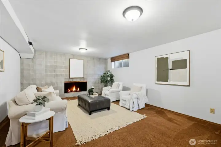 A wood-burning fireplace serves as the focal point of the spacious family room, offering plenty of room for relaxing, watching TV, or playing games. A wood-burning fireplace serves as the focal point of the spacious family room, offering plenty of room for relaxing, watching TV, or playing games.
