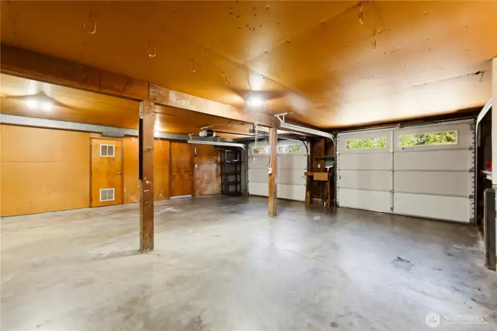 The oversized two-car garage offers ample parking as well as abundant storage space. The oversized two-car garage offers ample parking as well as abundant storage space.