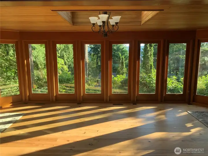 Sunroom with floor to ceiling windows