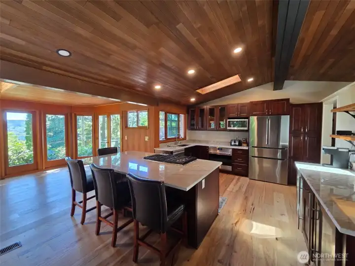 Kitchen with island and beverage station