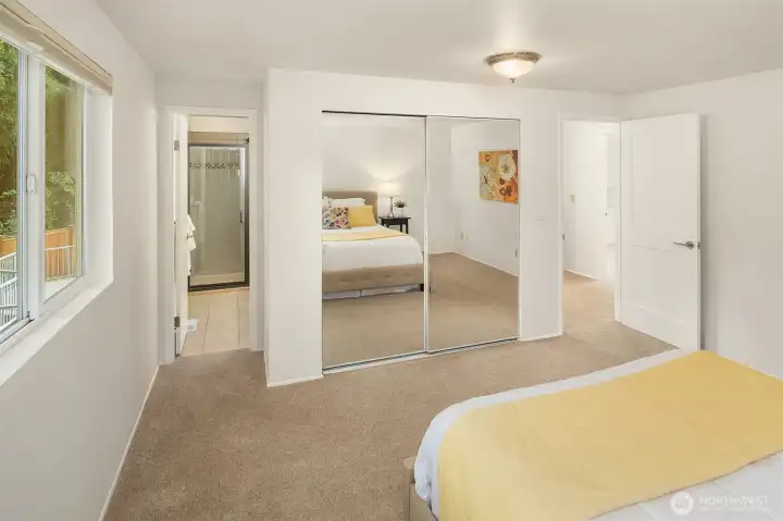 Relaxing primary suite with en suite 3/4 bath.