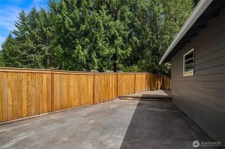 Large, 3-car garage plus fenced RV parking.