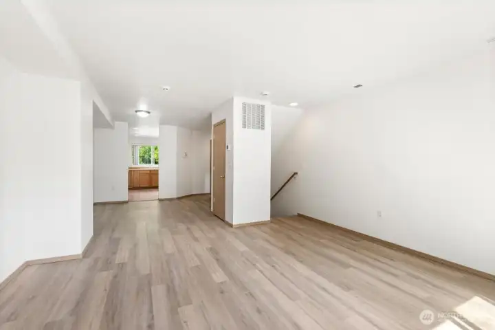 Living room with dining room with new flooring
