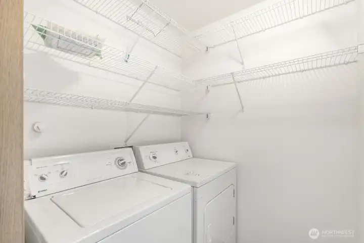 Laundry in utility room off kitchen