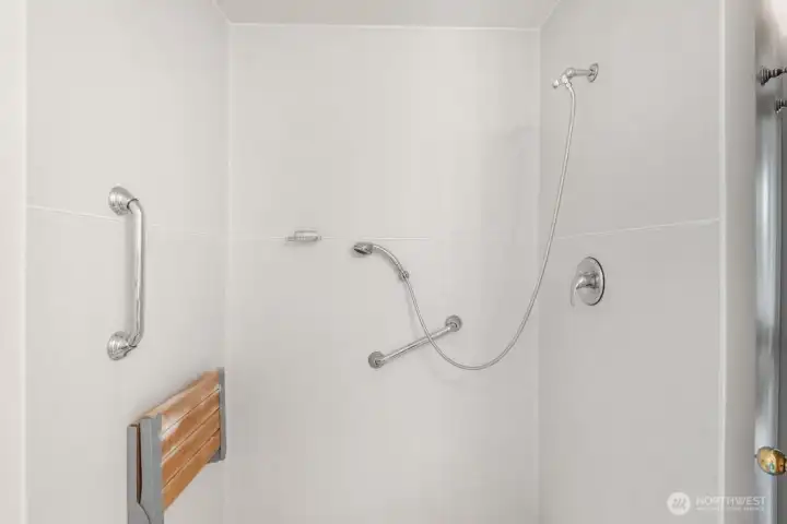Walk in shower with bult in seat and support bars