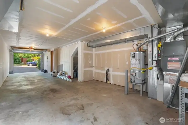 Tandem garage with hot water heater and furnace