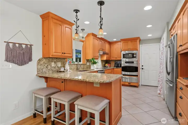 Remodeled kitchen-Bar seating, granite counters