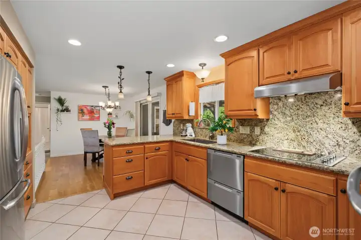 Beautiful tile and real hardwood in dining