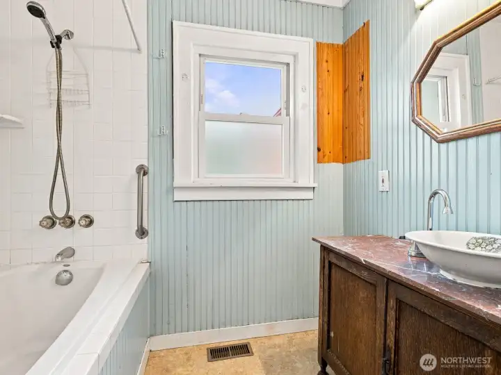 You could add a toilet to this portion of the bathroom for additional upside.