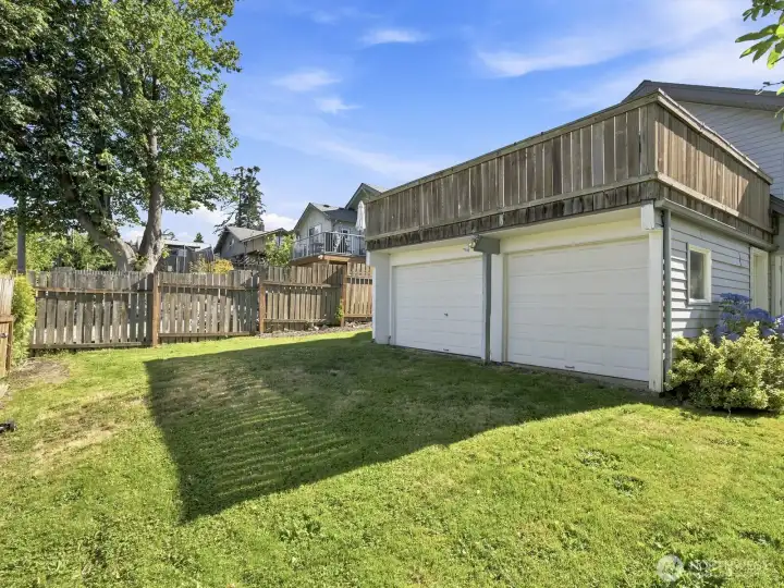The 2 car garage is off the back of the house.