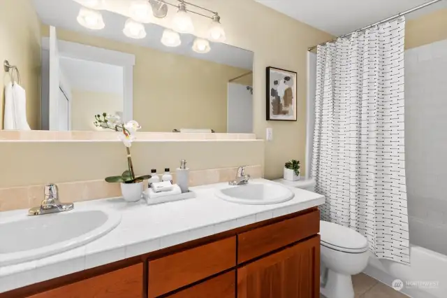 Large primary bath with double sinks.
