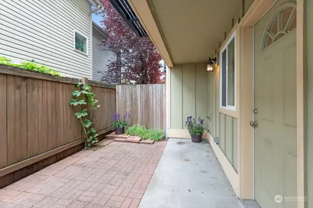 Fully fenced in yard/patio area is easy to maintain and is perfect for grilling or relaxing.