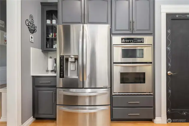 All gorgeous stainless appliances. This built in wall oven features the microwave above it.